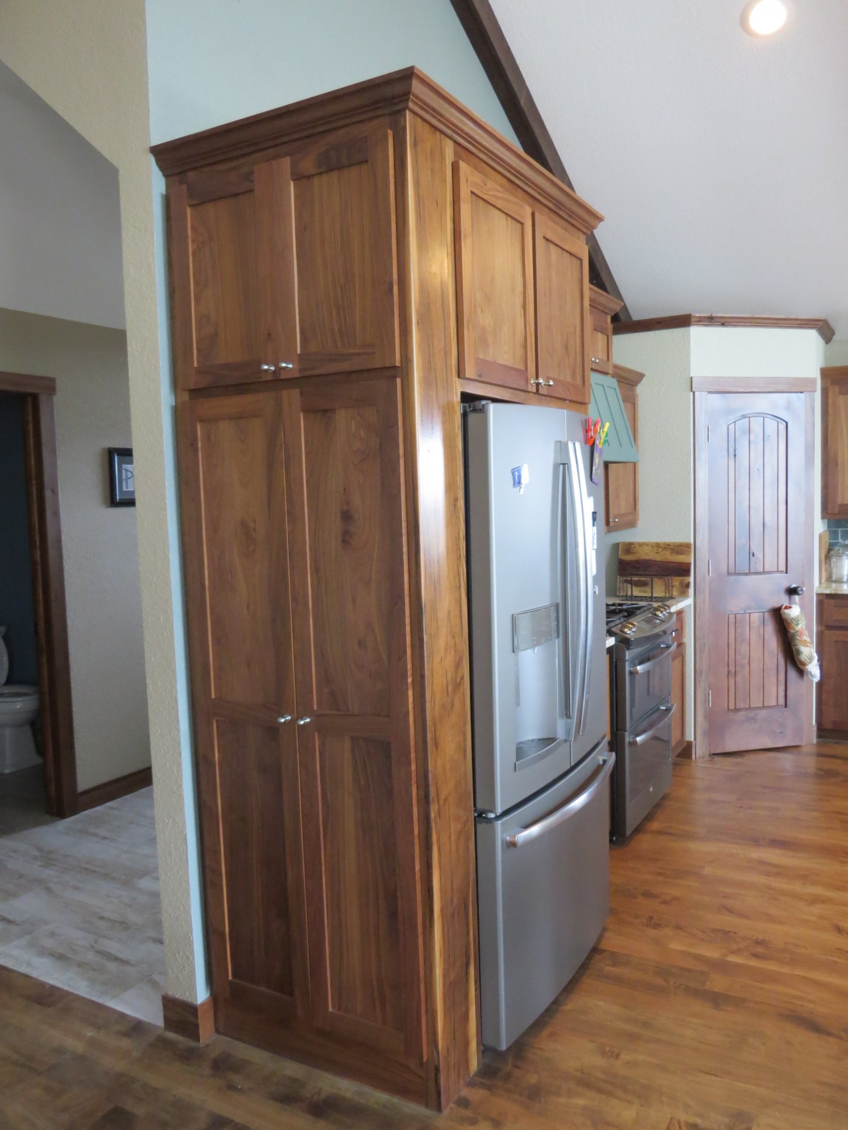 Stained Walnut Broom/Storage/Refrigerator Cabinet